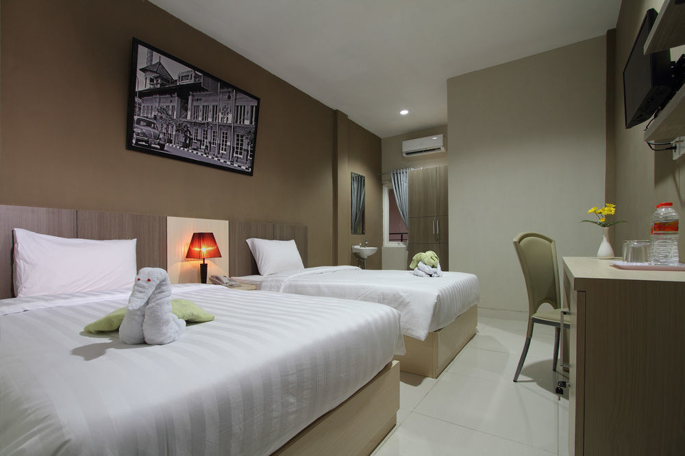 Oyo Flagship 3726 Tembok Batu Residence Tugu Eksteriør bilde